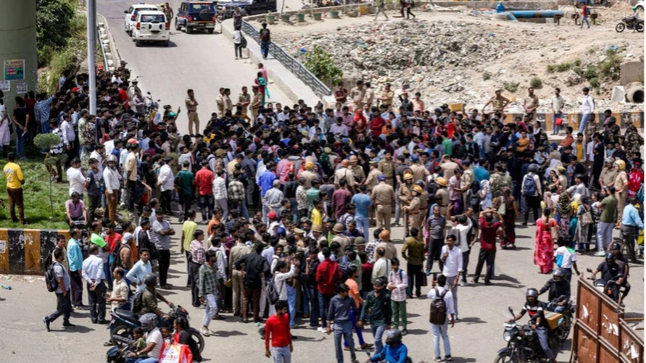 Contract workers protesting in an industrial area